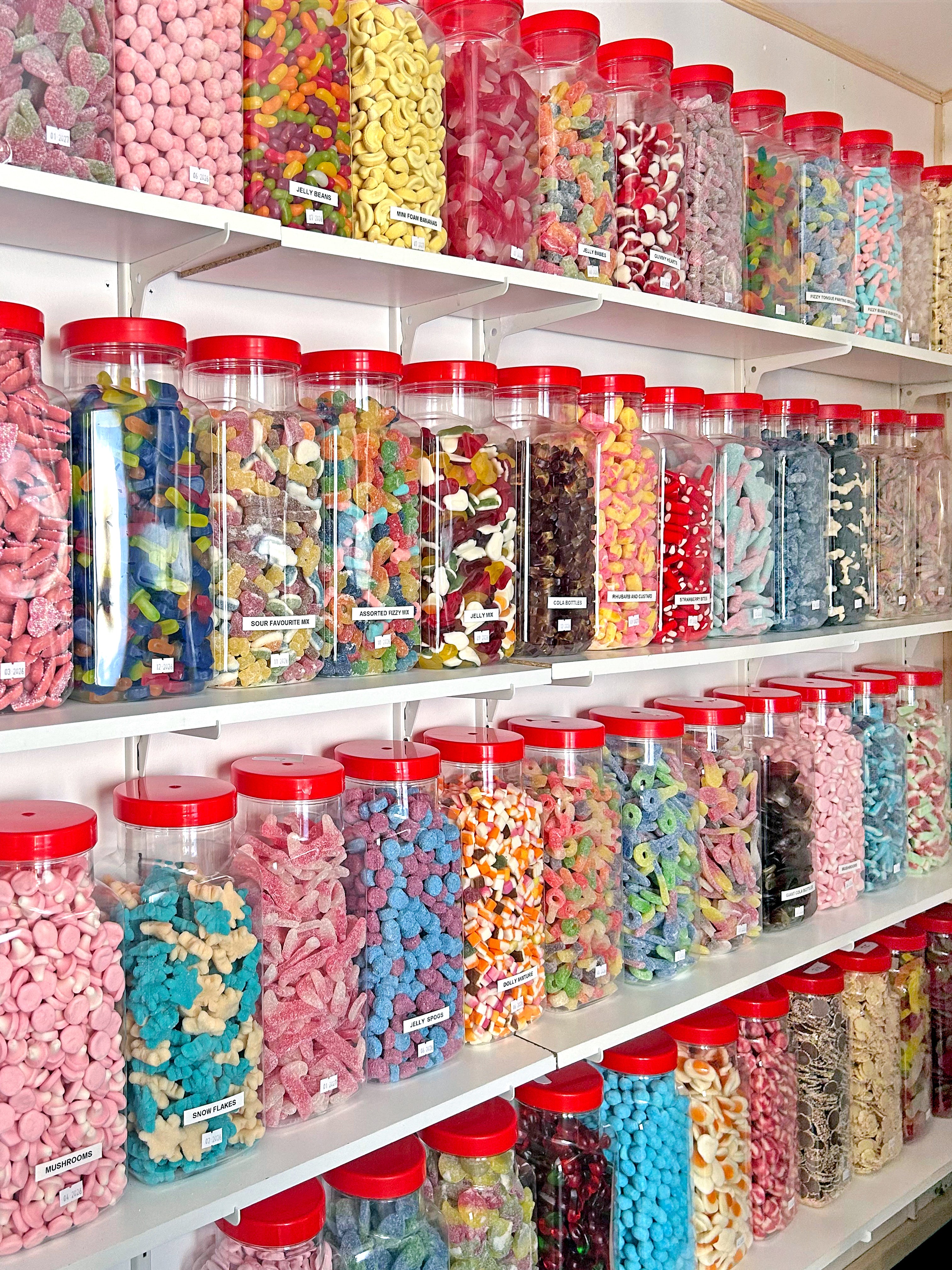 Shelves filled with colorful jars of candy