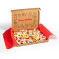 Birthday gift box of pick-and-mix sweets with a decorative lid inscribed with a sign, set against a white background.
