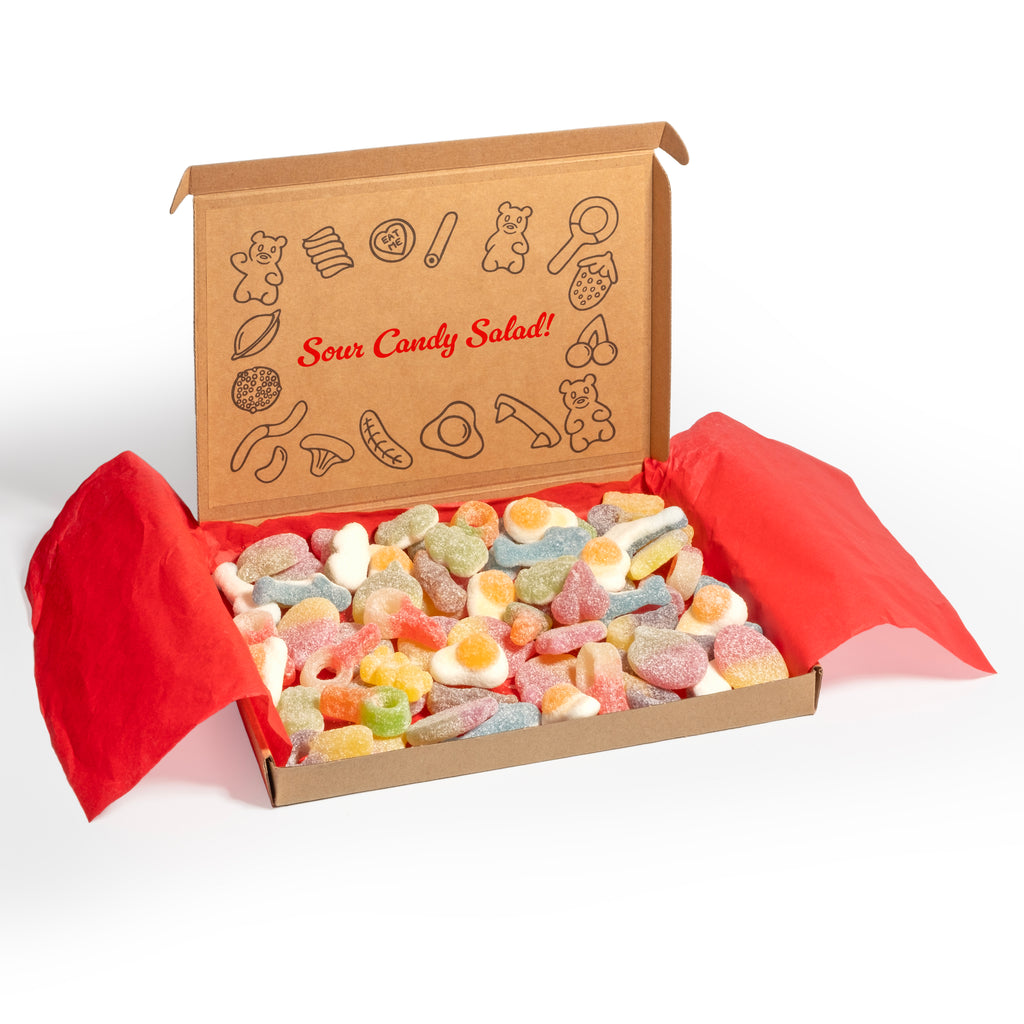 Gift box of sour sweets with a decorative lid inscribed with a sign, set against a white background.